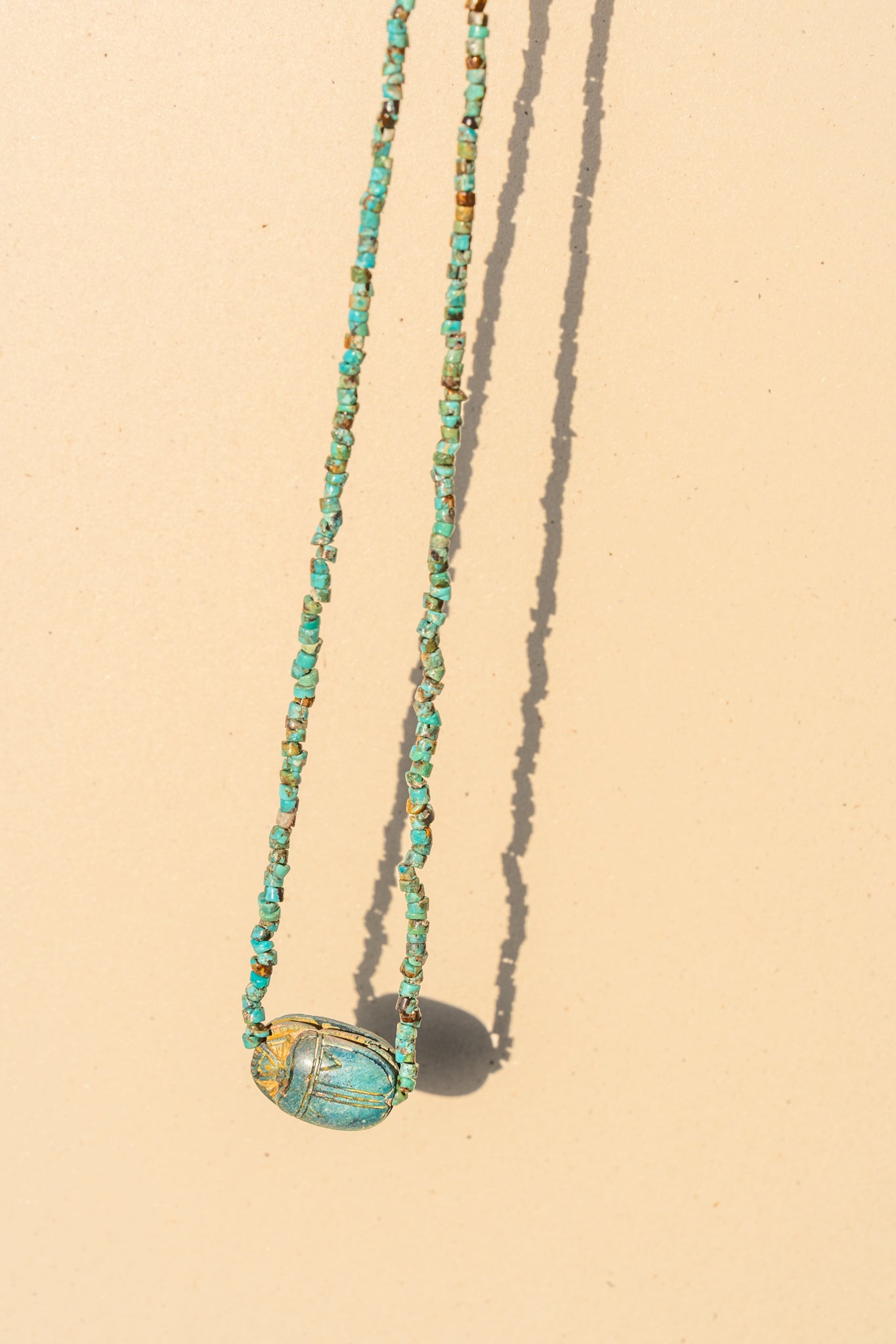 Rough Turquoise with Egyptian Scarab (14k Gold)