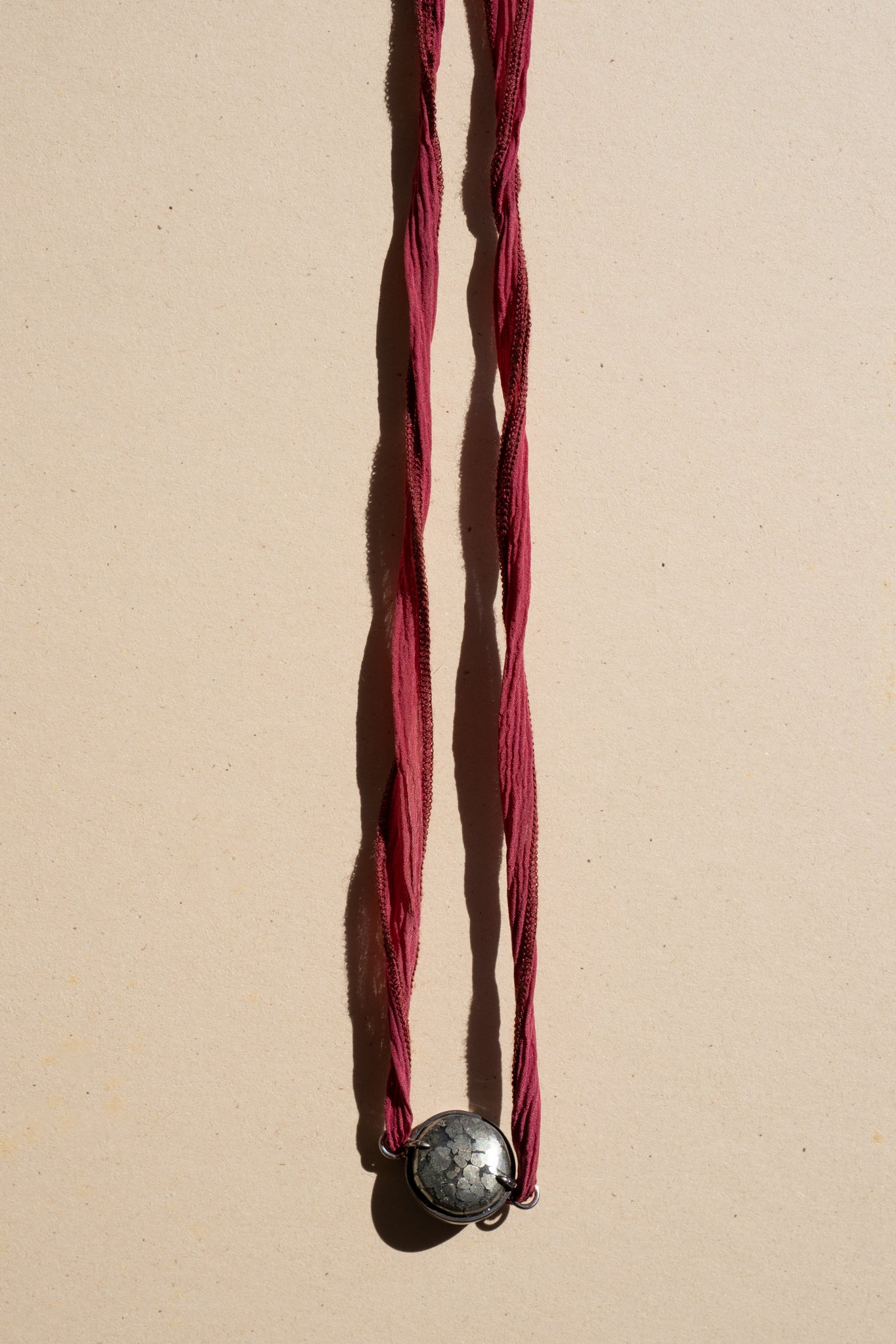 Pyrite Chocker on Red Silk