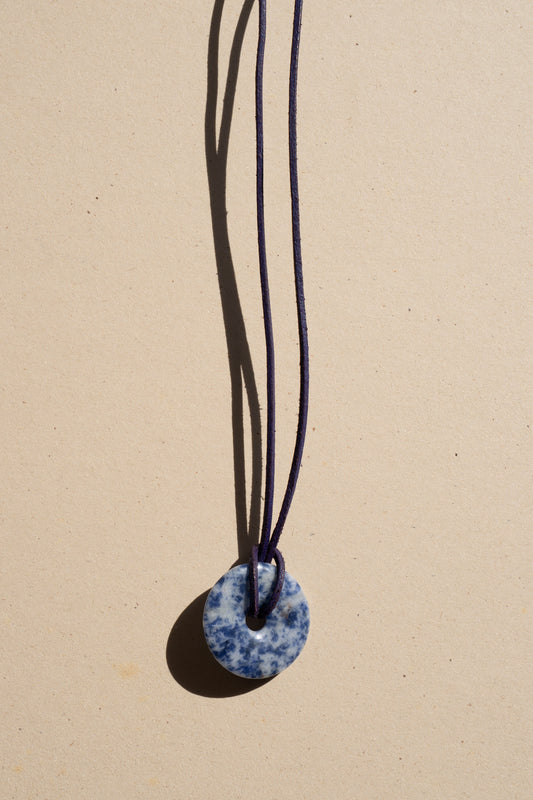 Sodalite Donut on Blue Leather