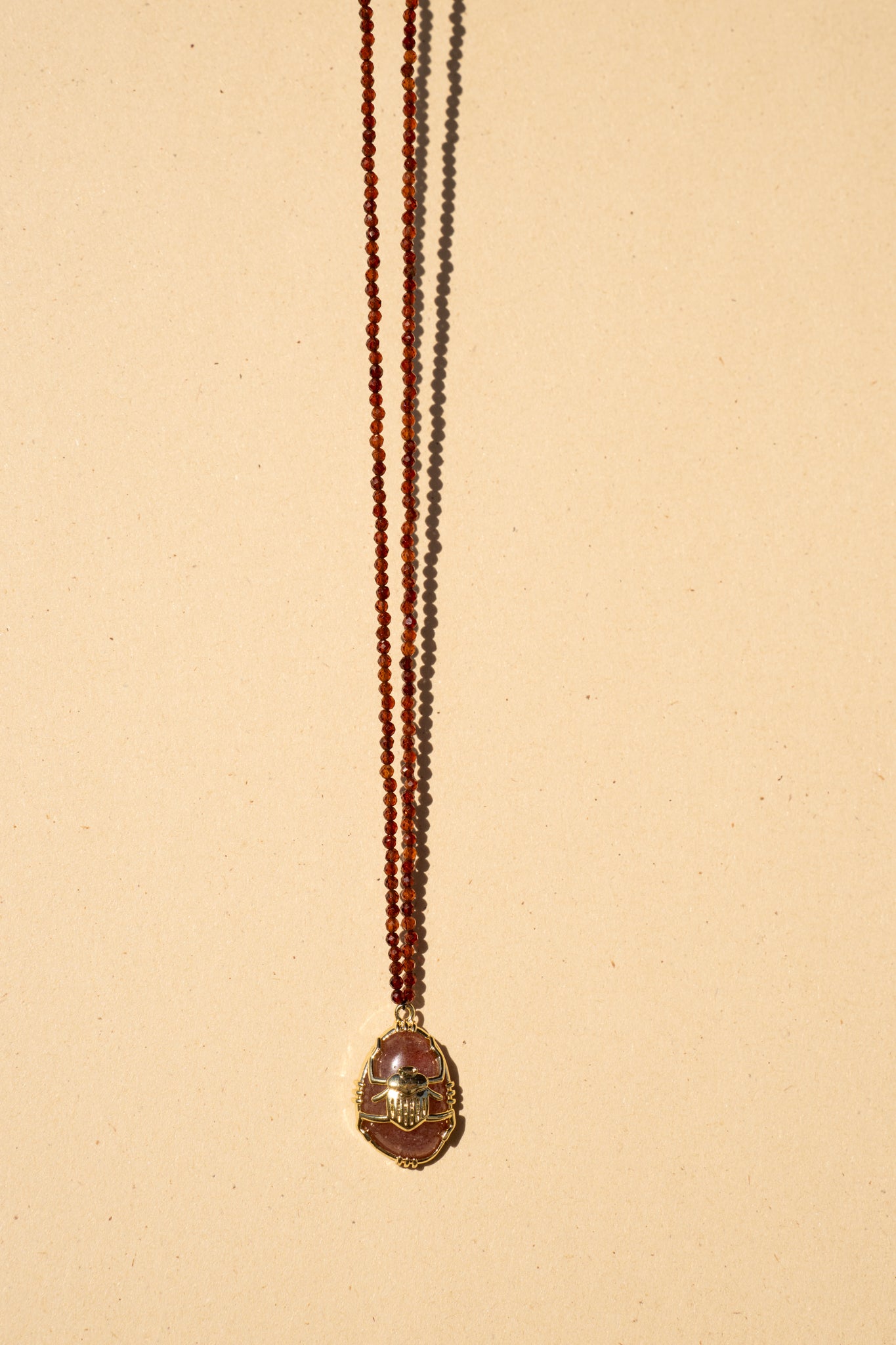 Mini Faceted Wine Garnet with Scarab Pendant
