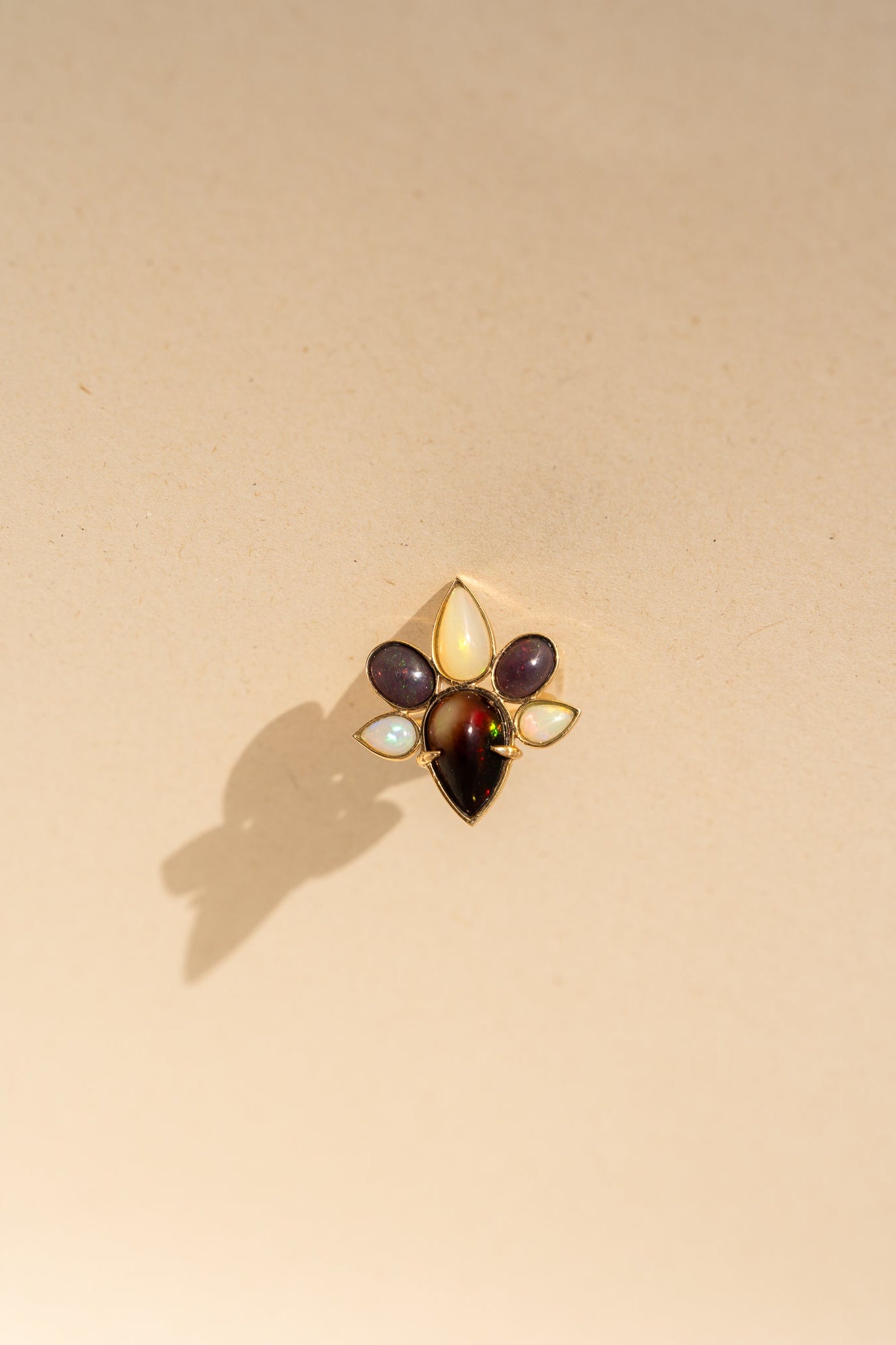 Brown, black and white Opal