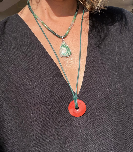 Red Jasper Donut on Green Leather