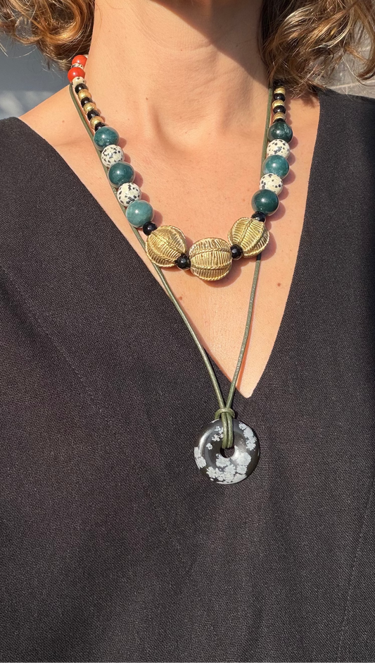 Snowflake Obsidian Donut on black Leather